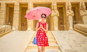 Girl in front of Queen Hatshepsut Temple - Egypt Tours - On The Go Tours