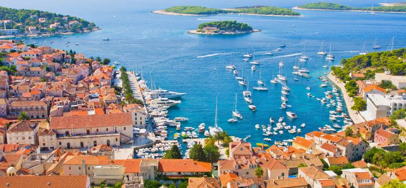 The island of Hvar stretching out into the sparkling blue sea