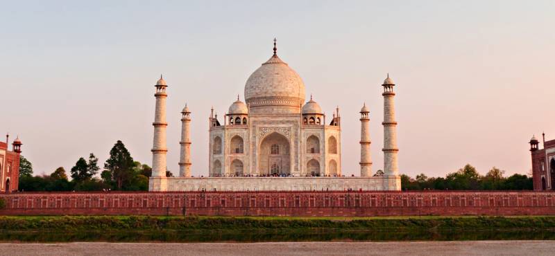The Taj Mahal at sunrise in Agra, India